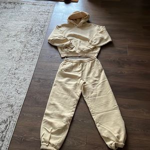 TNA track suit. Pale yellow. Size 2 hoodie, and size medium pants